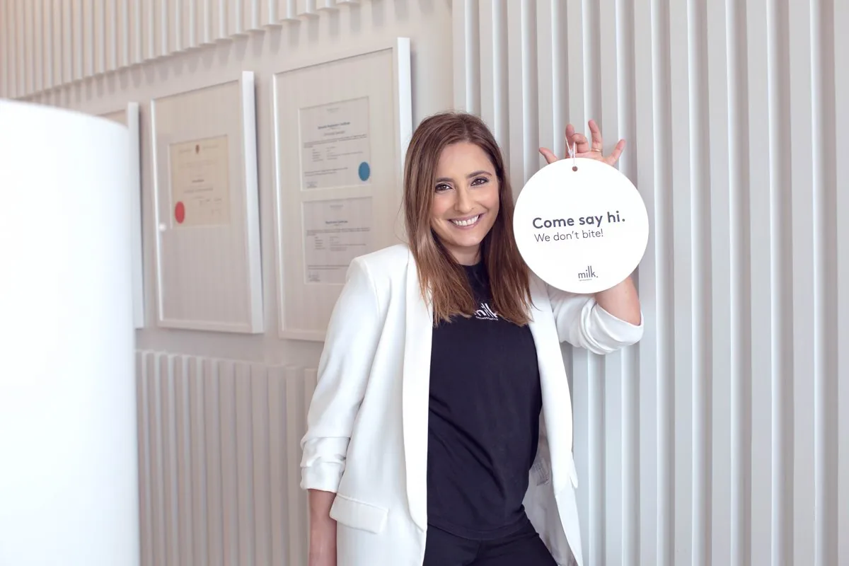 Come say hi sign at the reception of Milk Orthodontics in Newmarket, a short drive from Greenlane